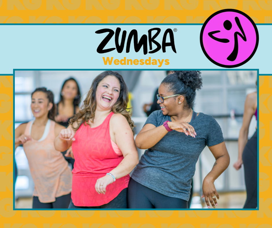 Two women dancing and smiling 